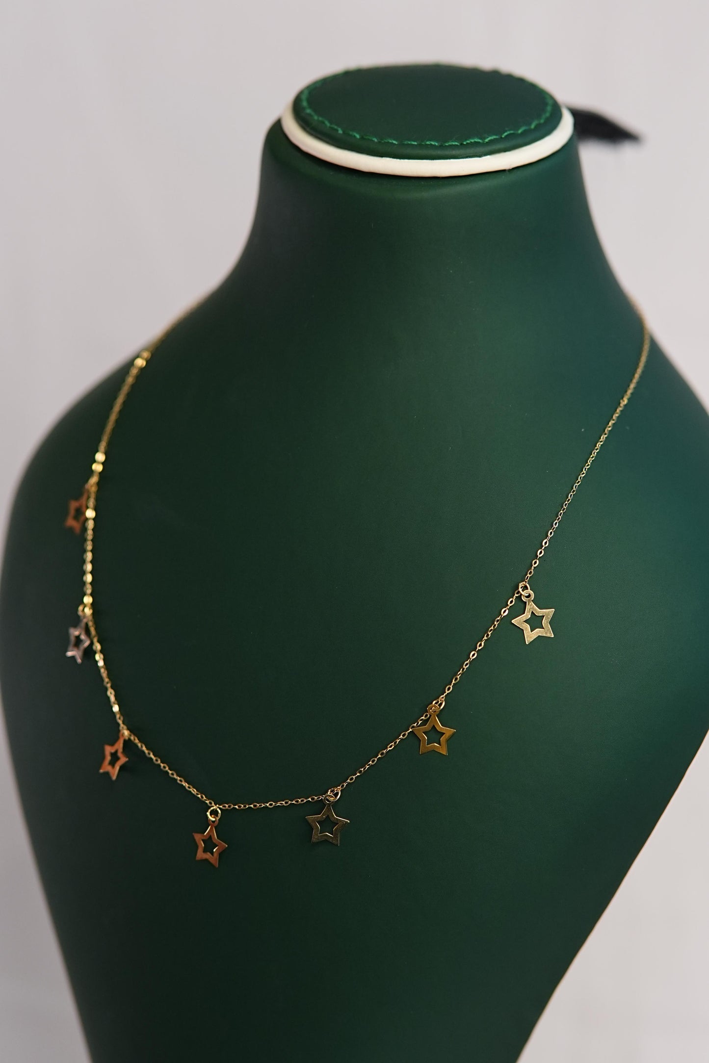 18K Gold Necklace with Multiple Star Designs