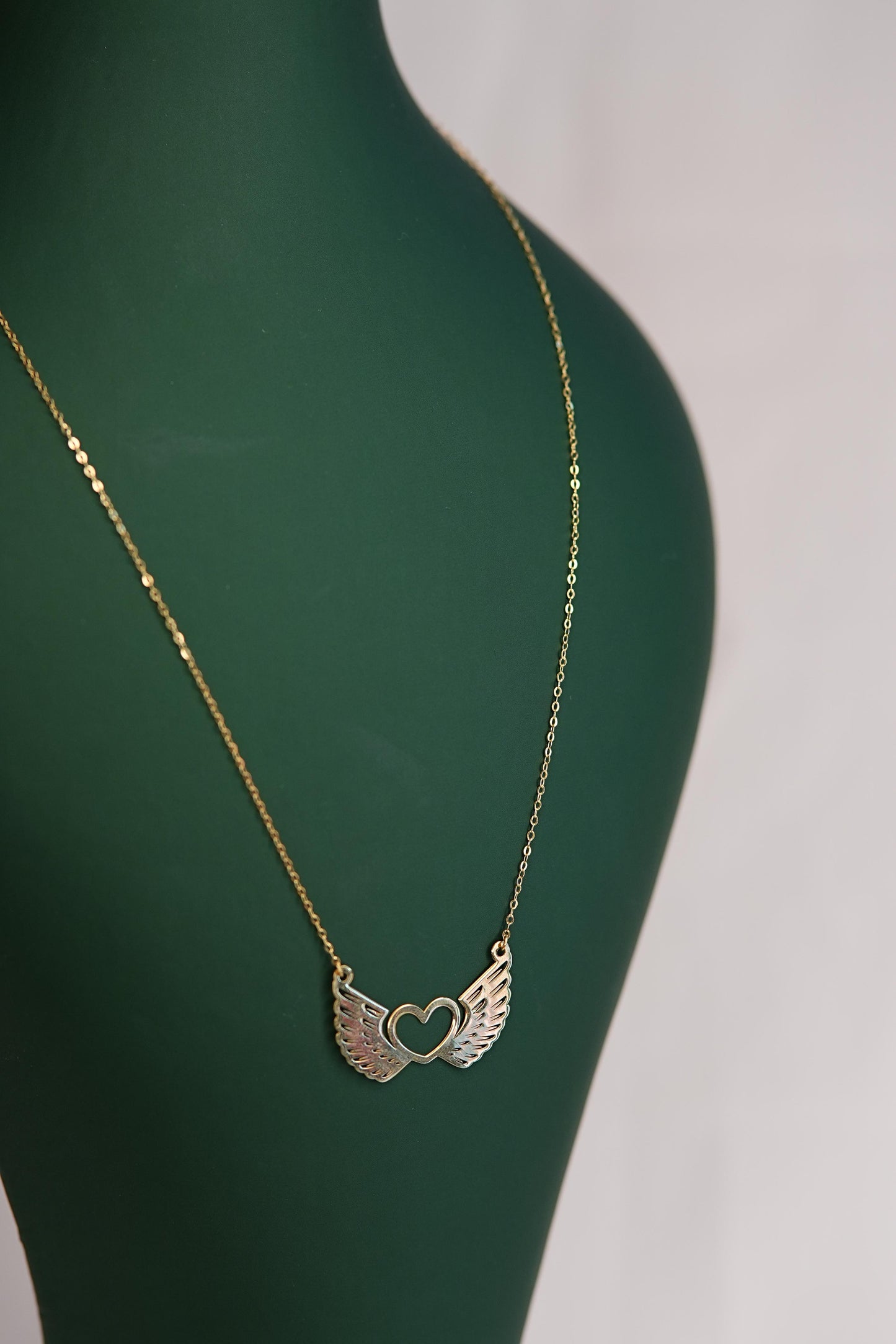 18K Gold Necklace with Wing Designs